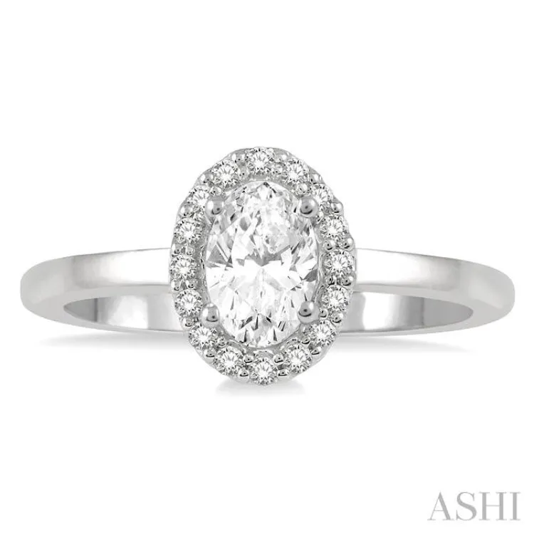 5/8 Ctw Oval and Round cut Diamond Ladies Engagement Ring with 1/2 Ct Oval Cut Center Stone in 14K White Gold