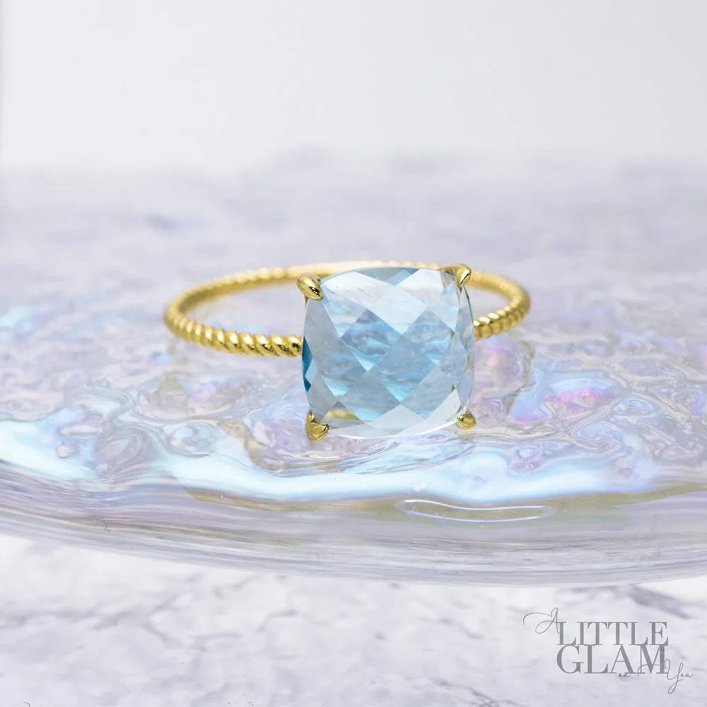 Delicate Cushion Blue Topaz Ring
