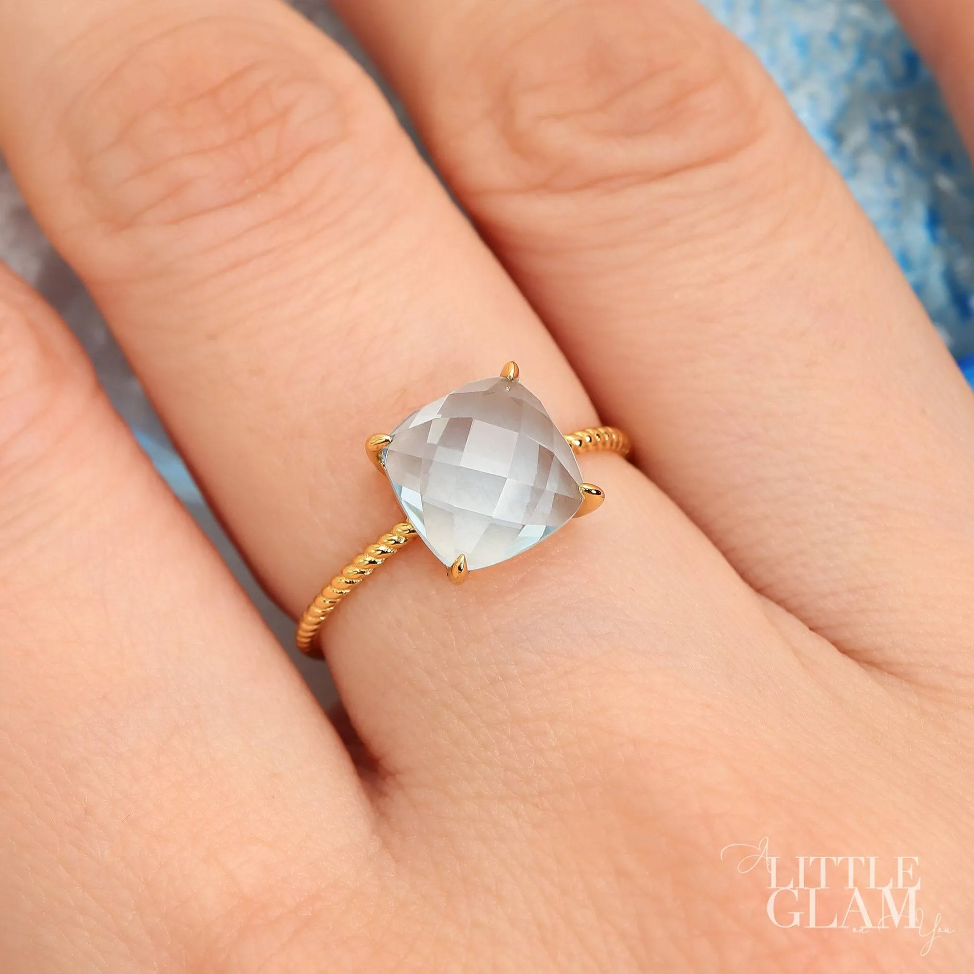 Delicate Cushion Blue Topaz Ring