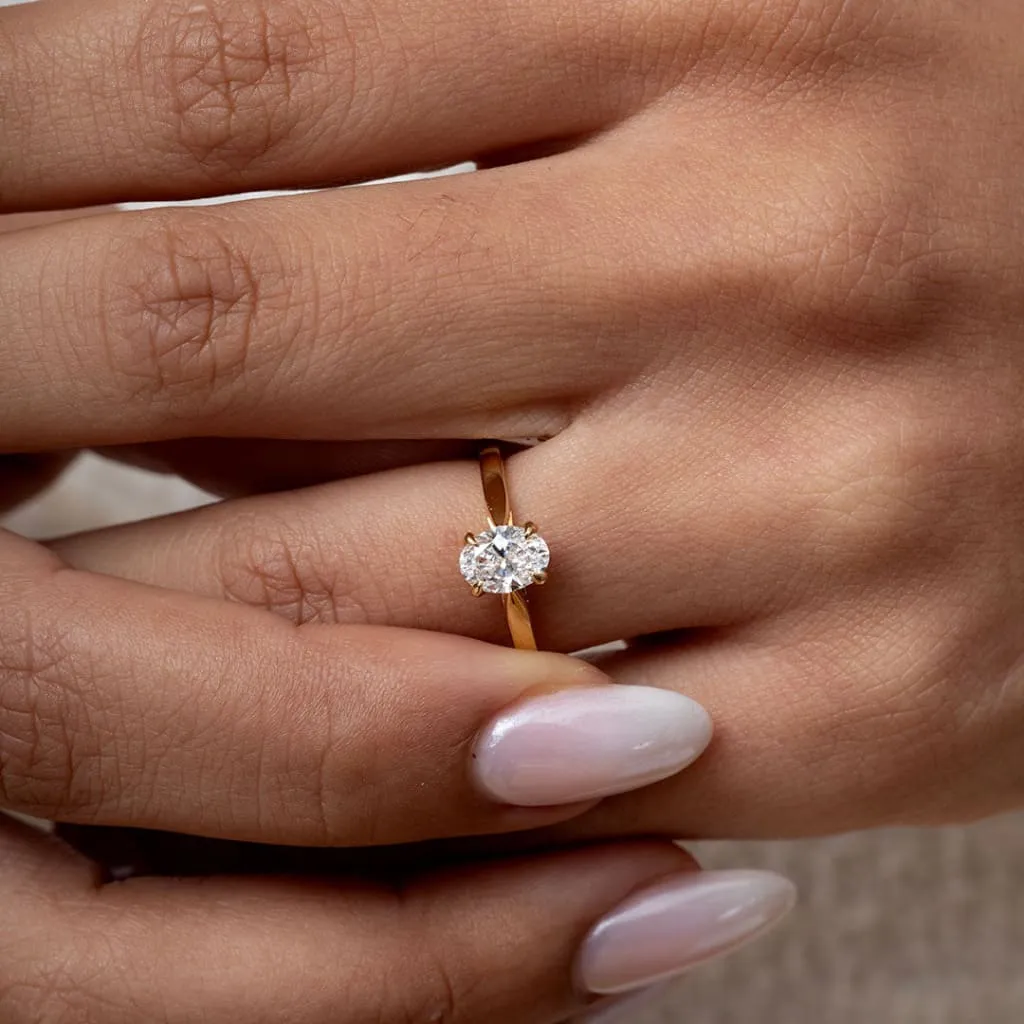 DELVIN | Oval Solitaire Diamond Set in 18ct Gold 0.75ct