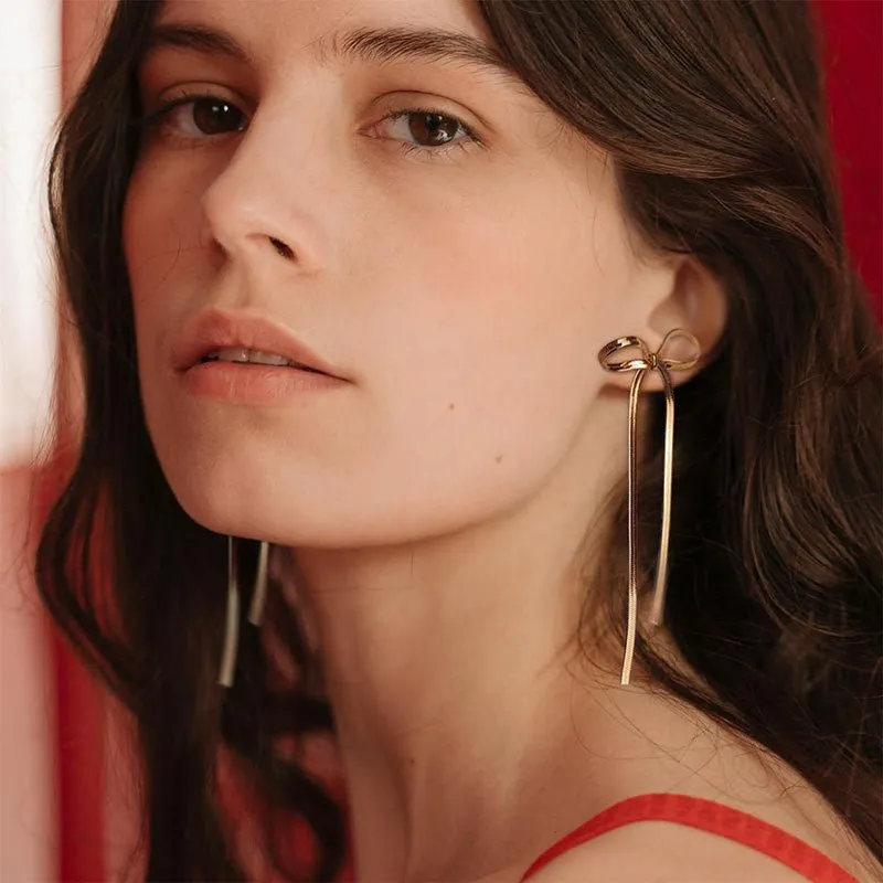 Long Silver and Gold Bow Earrings