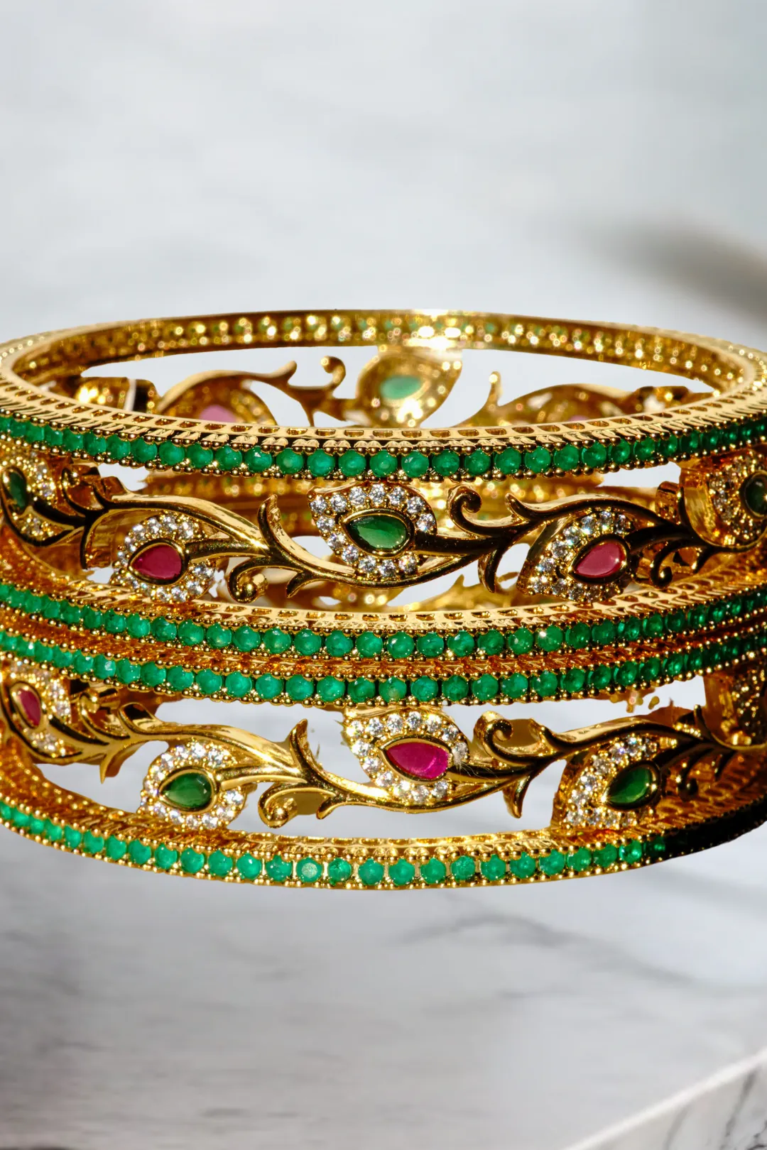 Norea Intricate Gold-Plated Bangle Set with Green and Ruby Stones (6-Piece Set)