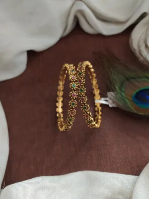 "Antique Floral Design Bangles with Kemp & Green Stones"