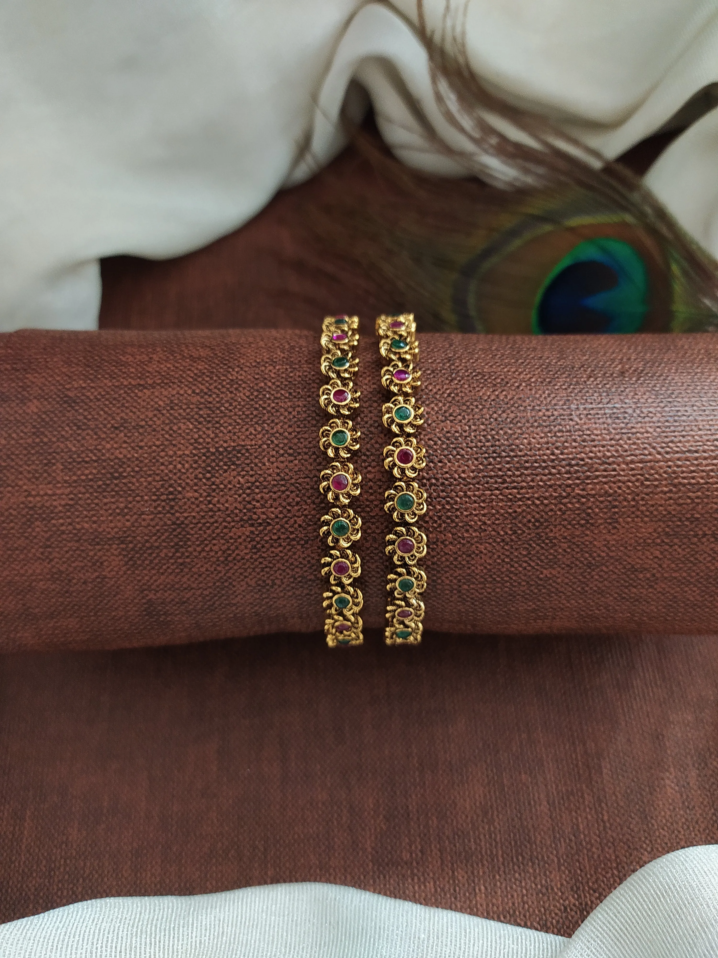 "Antique Floral Design Bangles with Kemp & Green Stones"