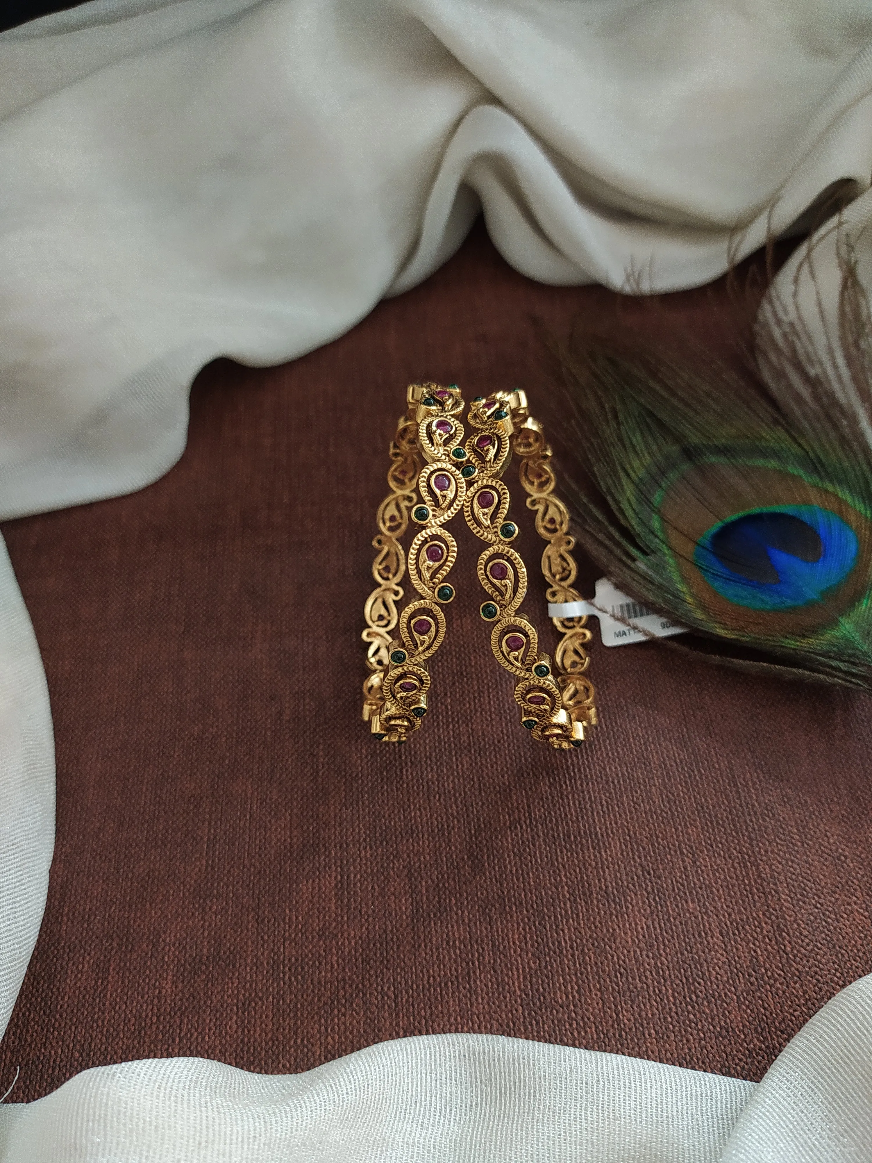 "Antique Mango-Shaped Bangles with Kemp and Green Stones"