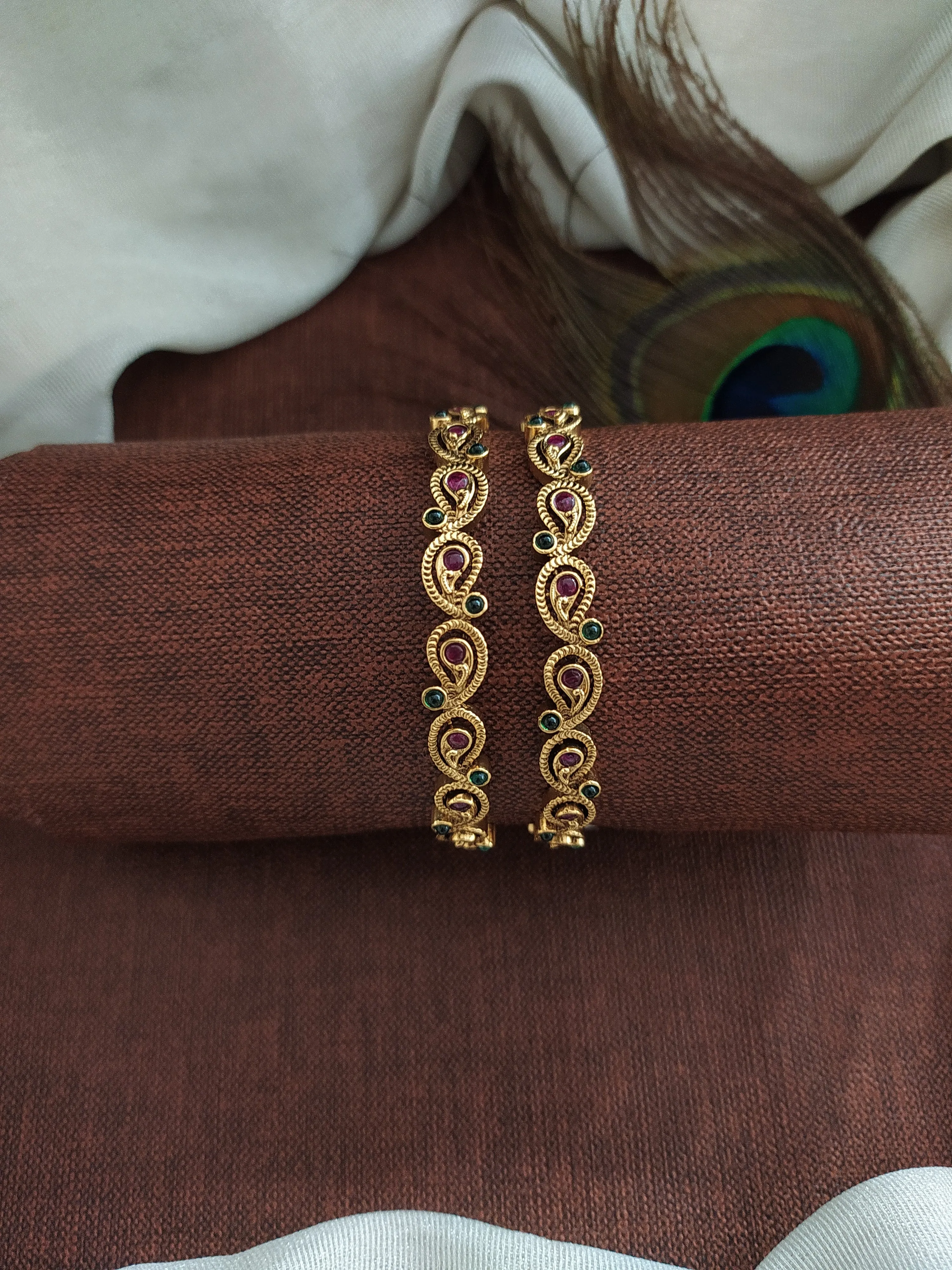 "Antique Mango-Shaped Bangles with Kemp and Green Stones"