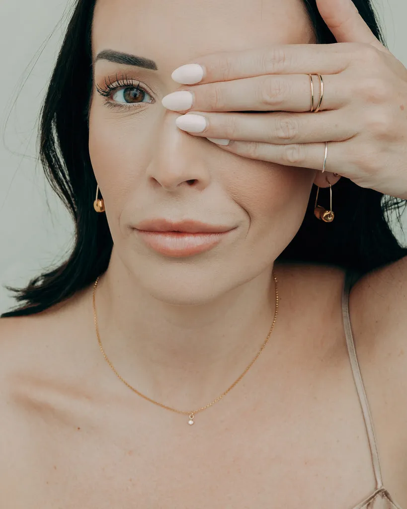 Sculpture Earrings in Gold