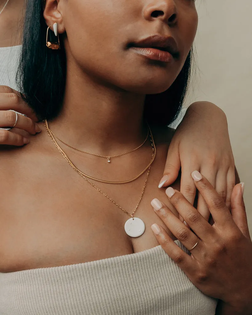 Sculpture Earrings in Gold