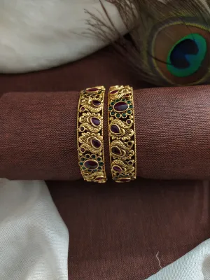 Sonal Fashion's appealing Floral & Peacock Kemp Stone Bangles