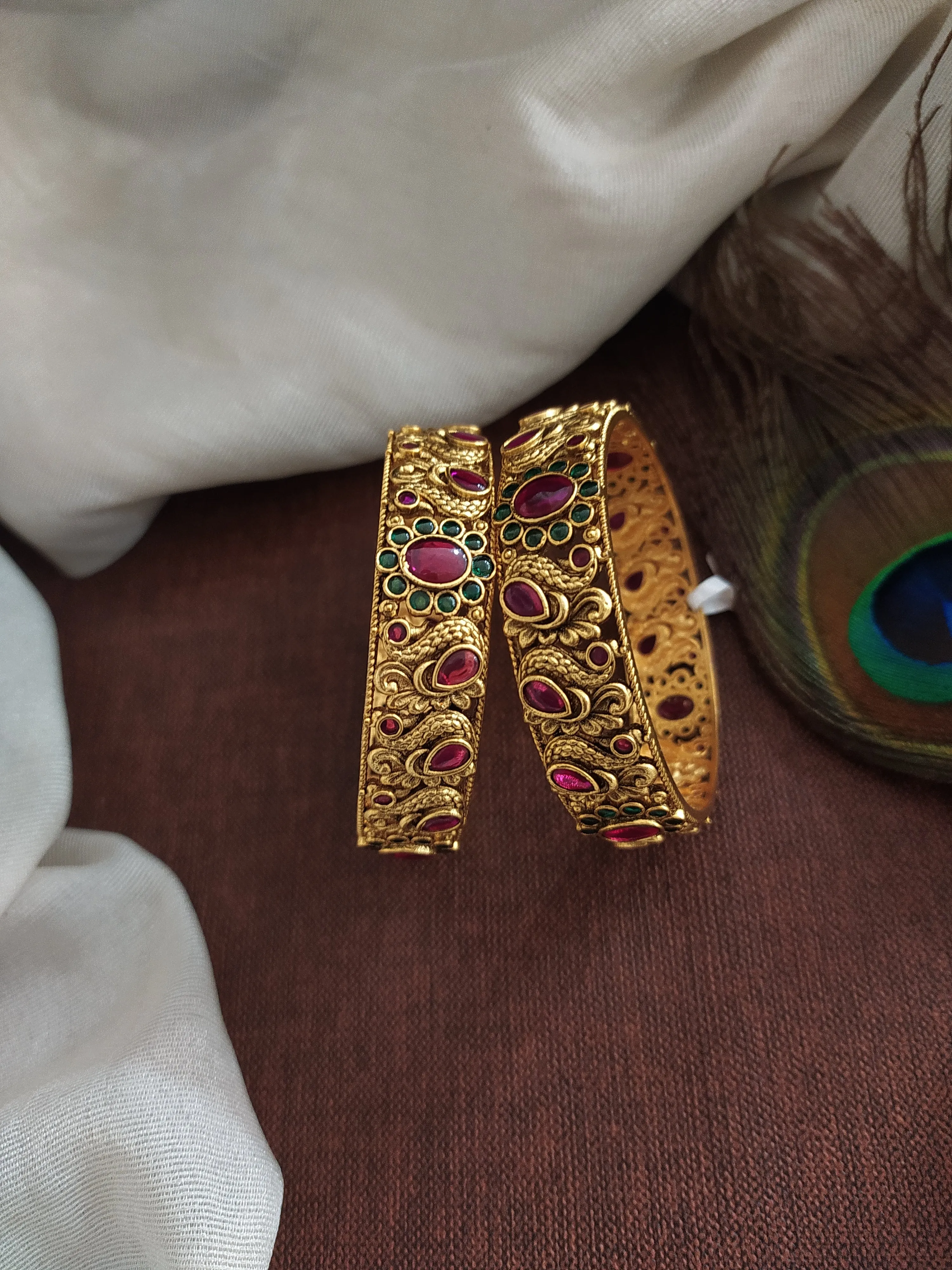 Sonal Fashion's appealing Floral & Peacock Kemp Stone Bangles
